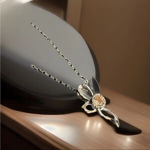 Sophisticated Silver and Gold Cross Necklace with Striking Pendant